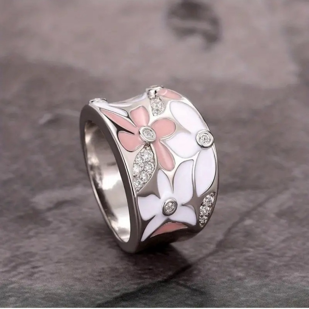 Silver plated pink and white floral enamel ring with zircon embellishment